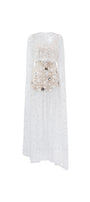 White lace dress with black sequins on a white background