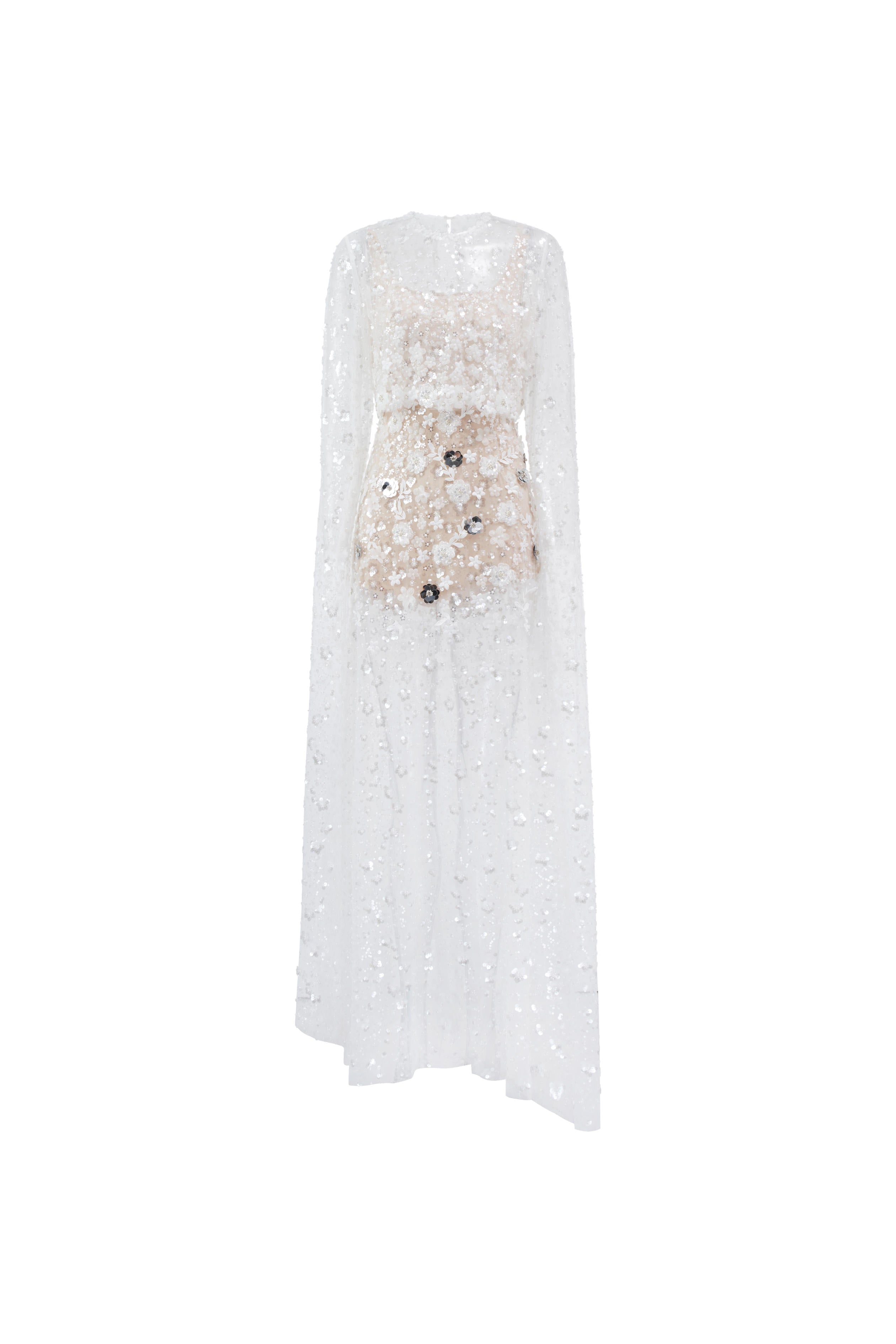 White lace dress with black sequins on a white background
